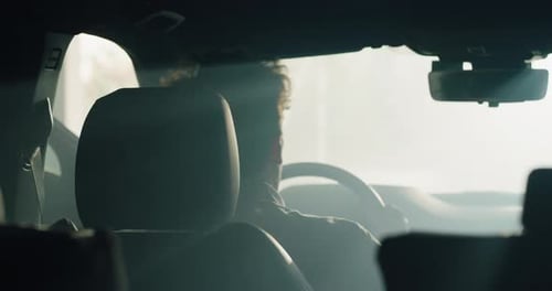 Man Getting Inside his Car in the Morning