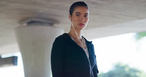 Woman Ready to Exercise in Urban Setting
