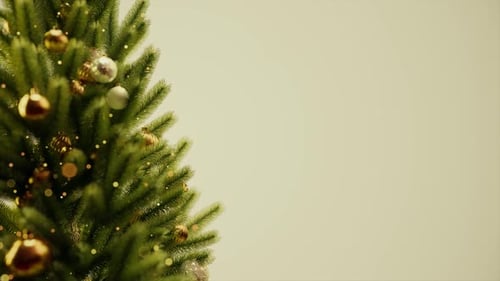 Animated Christmas Tree Decorated with Golden Ornaments and Sparkling Lights