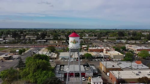Large water tower in san luis california , approaching drone shot