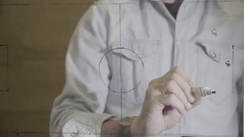 Football Soccer Coach Drawing Game Tactics on Glass Board