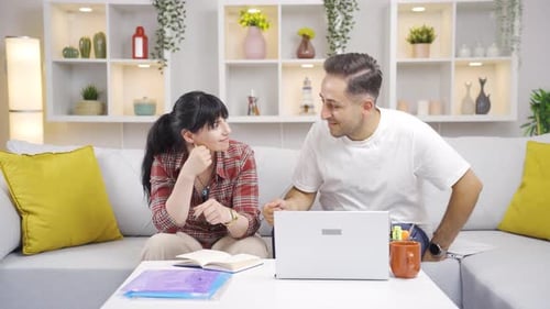 Happy Couple Celebrates Good News at Home