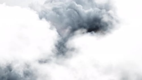 dark clouds in the sky with rays of lightning.