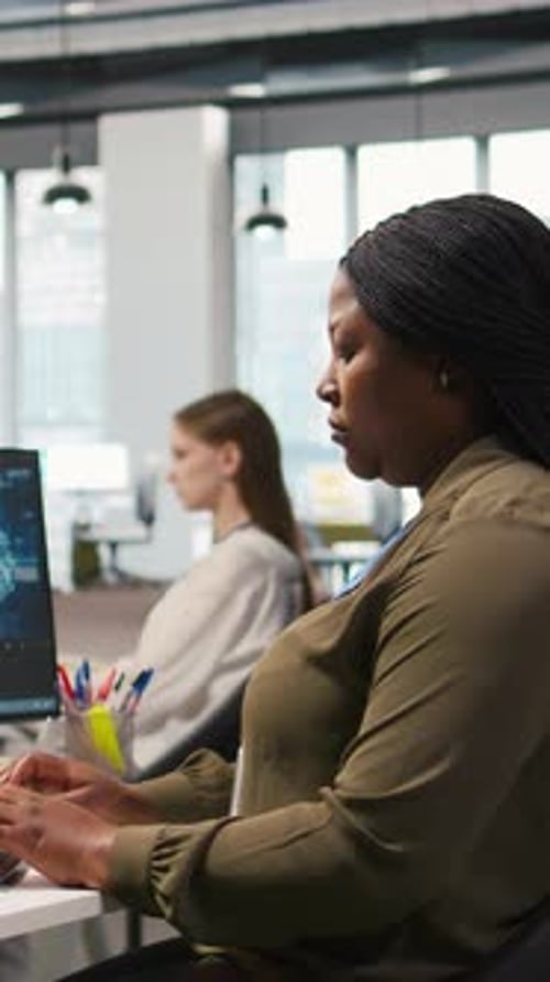 Vertical Video Jolly Female Programmer at Office Desk Pleased After Developing Application