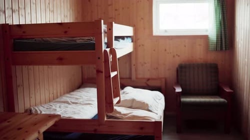 Bunk Bed and Chair in a Wood Planks Bedroom