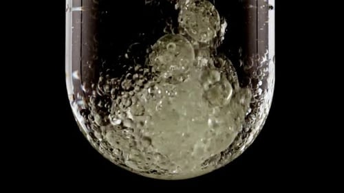 Bubbles Forming in Glass Container Experiment
