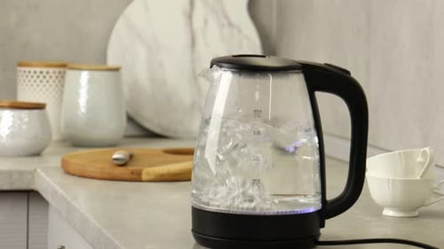 Boiling Water Inside a Clear Electric Kettle