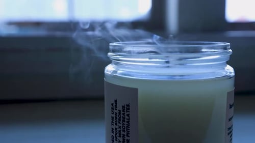 Candle Flame Extinguished and Smoke Rises