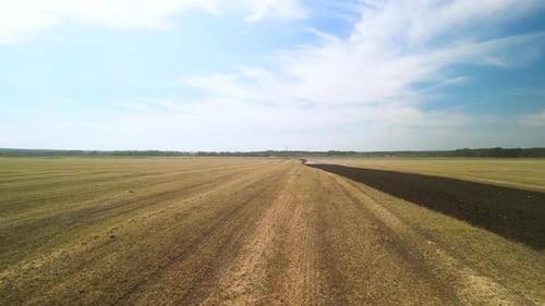 Tractors plowing the field in Ukraine