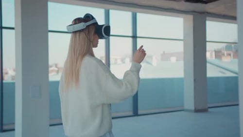 Shot Back Woman Using Making Gestures Swipe When Wearing Virtual Reality Empty Building Looks How