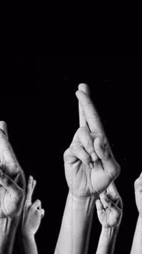 Spinning Halftone Fingers Crossed Hands Portrait Background Loop
