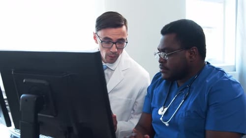 Doctor and Surgeon Talking Near Window Medical Workers in Hospital Office Day Light Healthcare