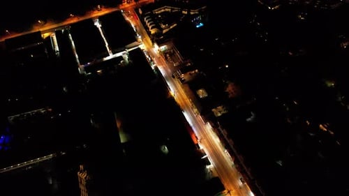 Top View of the Night City and Illuminated Road