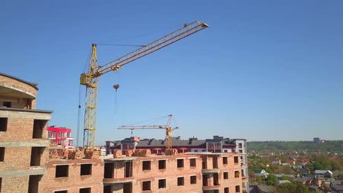 High Industrial Tower Crane at Construction Site of New Residential Building