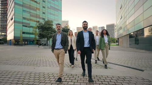 Group of Successful Company Professionals Walking in the City Business People Team Together with