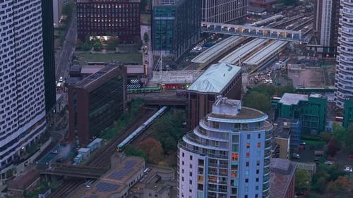 Cinematic Aerial Flight Over London Suburbs and the Modern Skyline