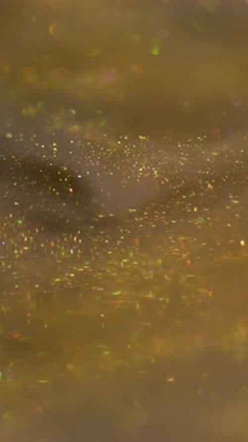 Abstract Background of Sparkling Gold Glitter