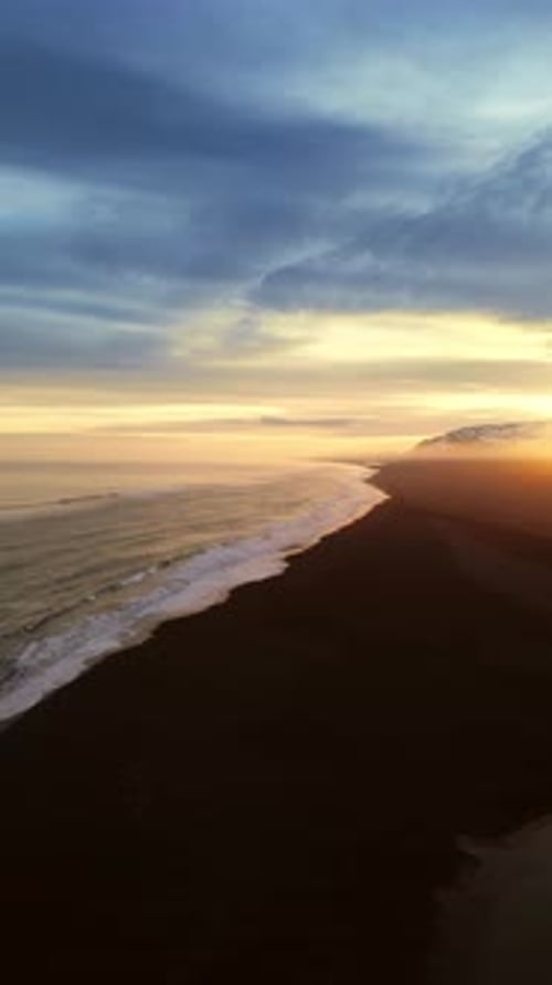 Vertical Video Icelandic Black Sand Beach Aerial View