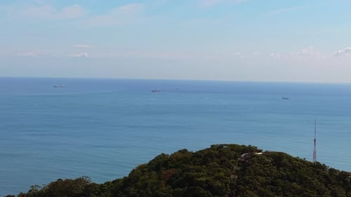 Aerial View of Commercial cargo Ships sailing at atlantic ocean, commerce international