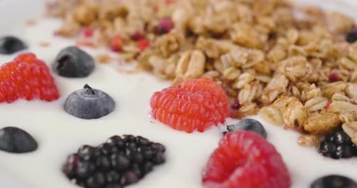 Colorful Berries and Granola Topping Yogurt
