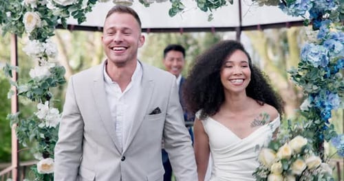 Couple, wedding and walk with flower confetti for event, celebration and outdoor in nature