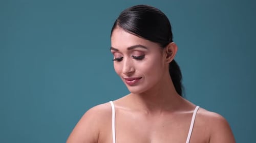 A close-up beauty portrait of a woman face, highlighting radiant skin and skincare concepts.