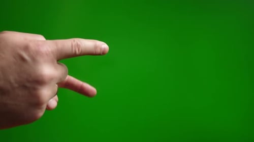 26a. Fingers drumming on a green background.