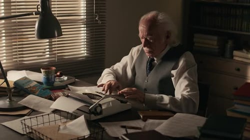 Senior Writer Typing New Book on Vintage Typewriter