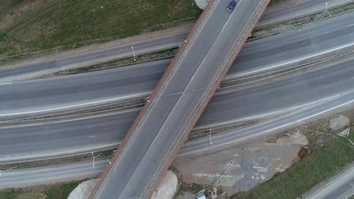 Aerial Top Down View of Highway Interchange Junction Road with Traffic Shot with Camera Rotation