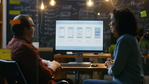 Beautiful Female Mobile Gaming Application Developer Talks With Her Male Colleague, They Discuss Cr