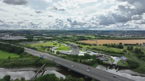 4K close up aerial push in towards the The Kelpies, the largest quine sculptures in the world. Edinb