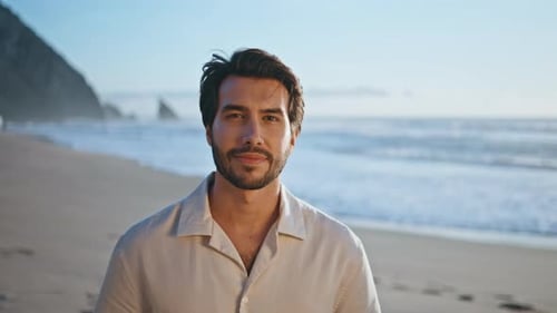 Attractive Italian Guy Standing on Beach Enjoying Beautiful Seascape Close Up
