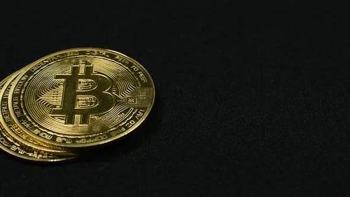 Passing By Golden Bitcoins on Black