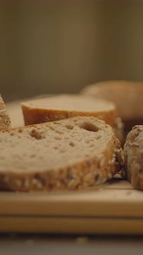 Sliced Bread on Cutting Board Close Up