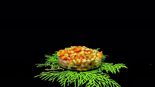 Corn Kernels in Bowl with Evergreen on Black