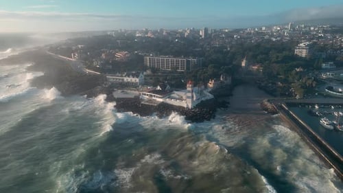 Aerial view flight drone coast waves Cascais Portugal. Coastal town beautiful nature on wild Atlanti