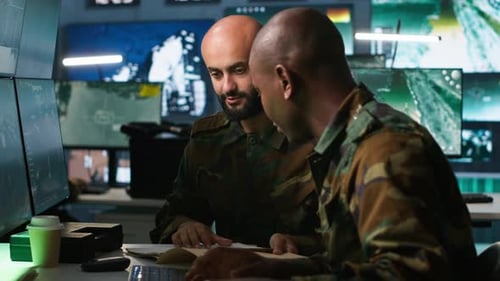 Army Officers Doing Brainstorming in Command Center Looking at Intel