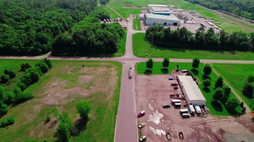 Aerial View of Semi Truck with Hopper Trailer at Rural Intersection. Agricultural transportation.