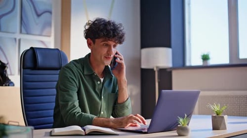 Positive Employee Talking Mobile Phone Sitting Corporate Office Desk Closeup