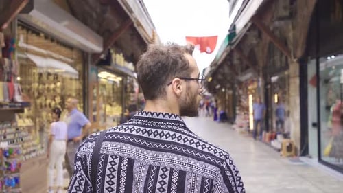 Man walking in Istanbul Spice Bazaar.