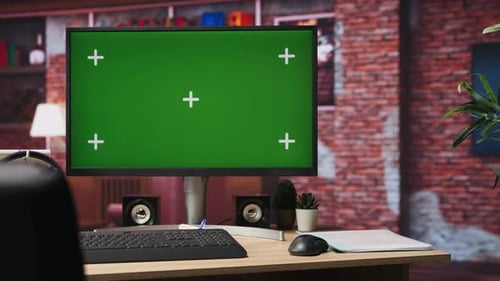 Chroma Key Computer Display in Loft with Shelves Filled with Books in Background
