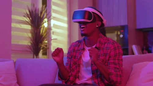Man Enjoying Virtual Reality Gaming at Home