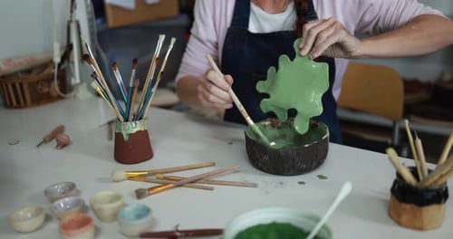 Artist Woman Painting Ceramics Objects Inside Creative Studio