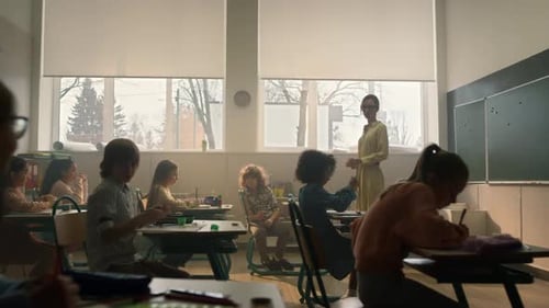 Children and Teacher in Bright Classroom