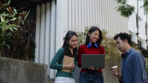 Student friend sit and talk about learning content subject in classroom in university or high school