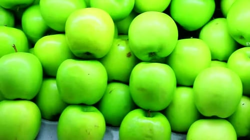 fresh green apples at fruit market
