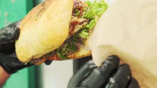 Gourmet Sandwich Preparation and Wrapping Close Up