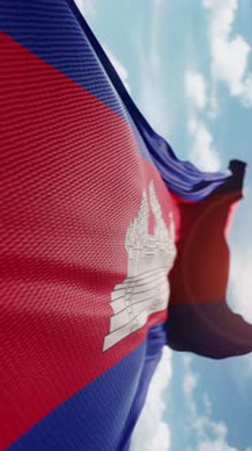Realistic Waving Cambodia Flag Loop Against Blue Sky