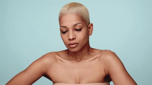 Beautiful Woman Posing Confidently In Studio