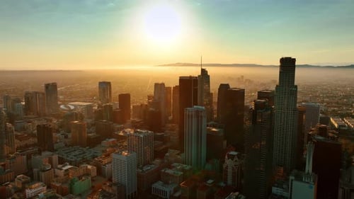 Soft light of golden hour illuminating the scenery of a vast Los Angeles, California, USA